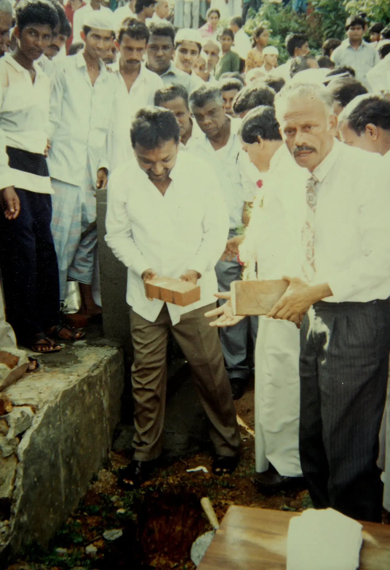 Imthiaz Bakeer Markar proudly putting a first stone